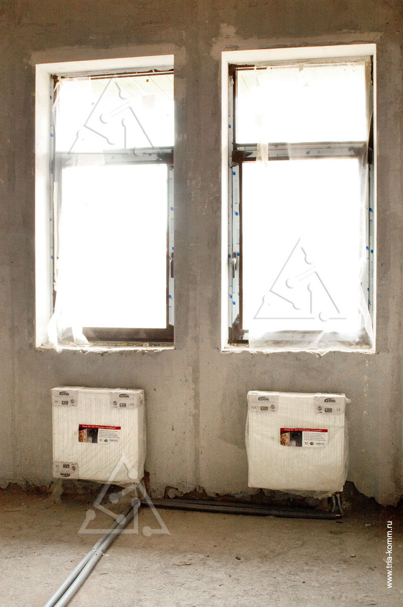 Фото выполненного монтажа традиционных радиаторов отопления