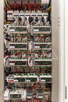 Модули Crestron на DIN-рейках для управления системой освещения и системой предотвращения протечек воды