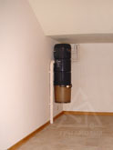 Агрегатный блок «центрального пылесоса» в подсобном помещении загородного дома